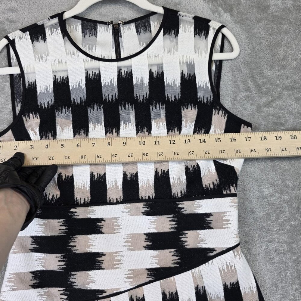 BCBGMAXAZRIA Blouse Womens S Black White Geometric Asymmetrical Peplum Top Lined - Picture 9 of 11